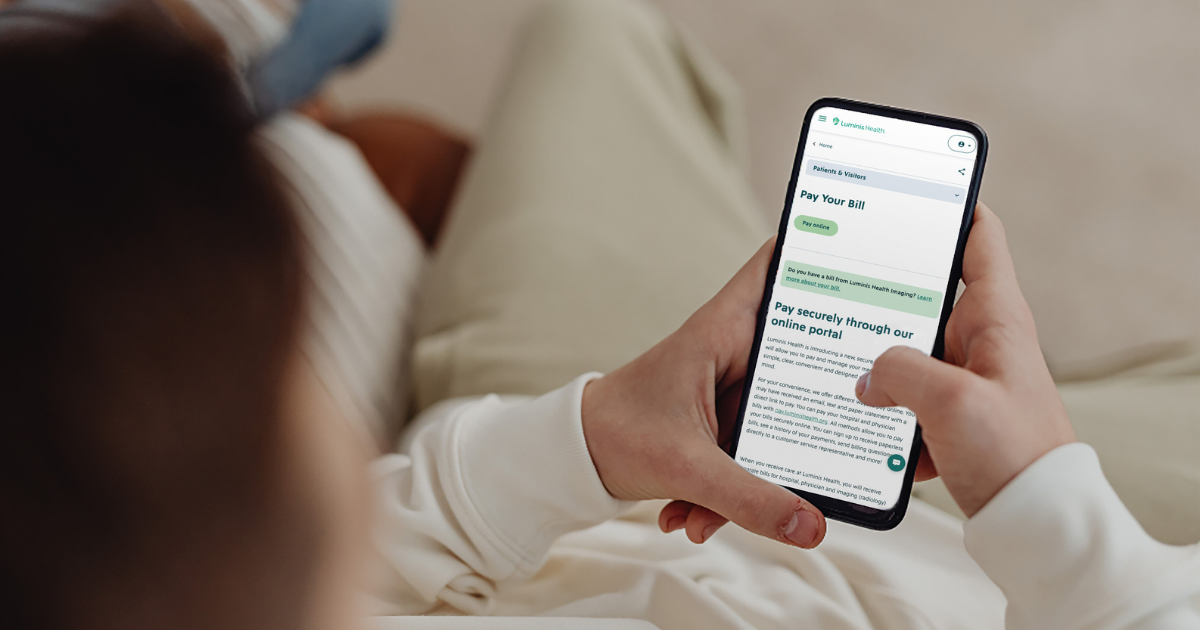 A girl using her phone to view her provider’s website