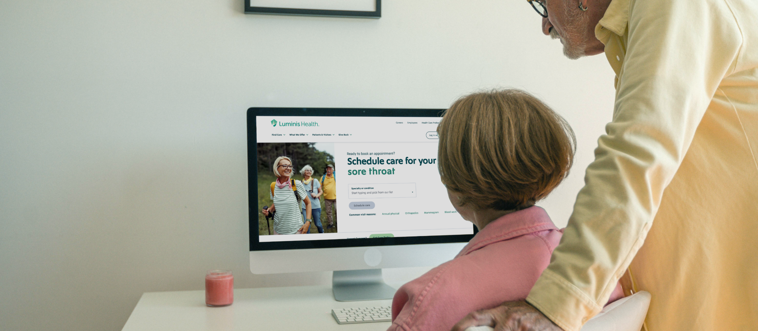 Couple looking at Luminis Health website