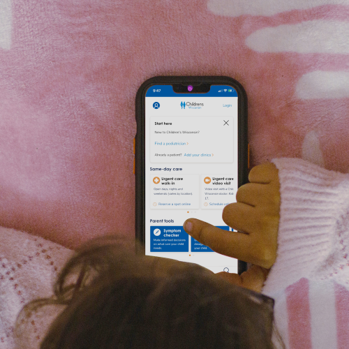Girl engaging with children's wisconsin movie app