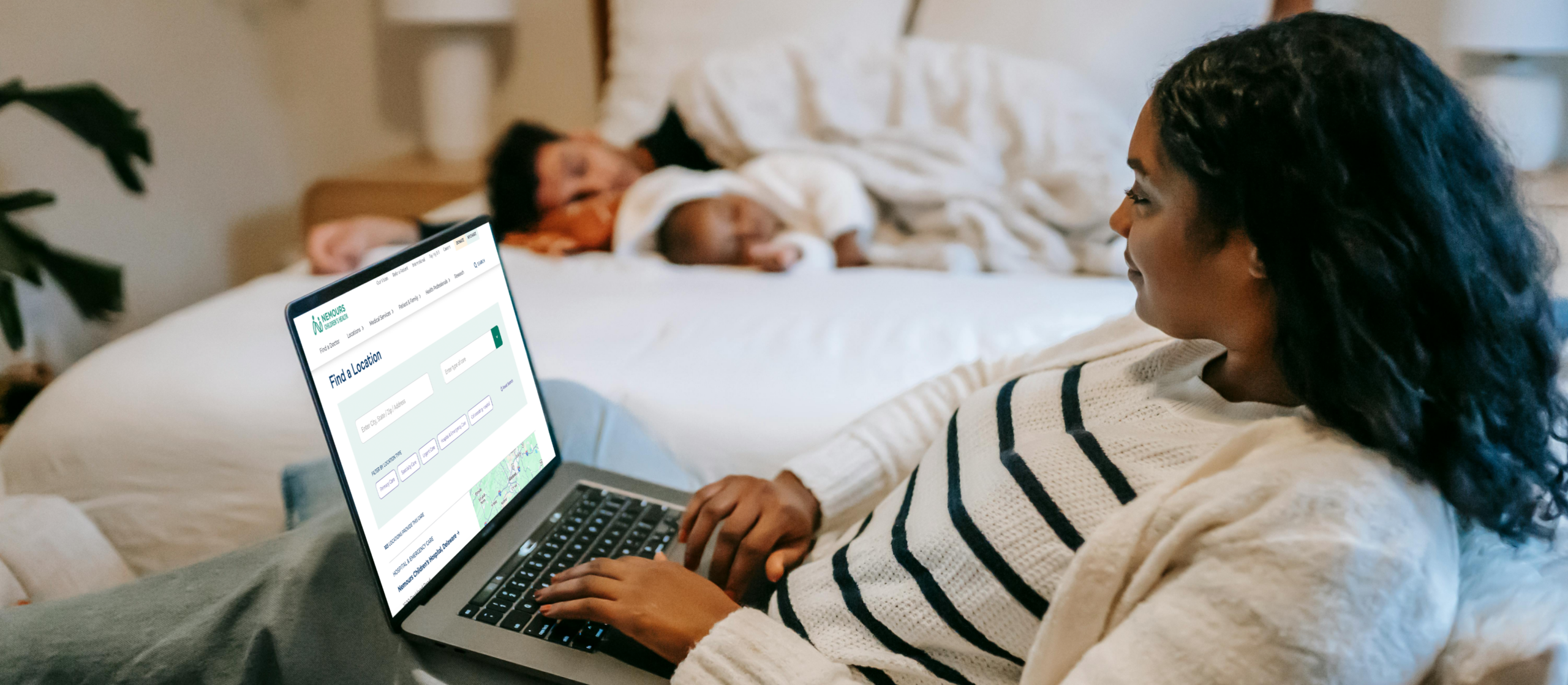 mother looking at Nemours Children's locations on website