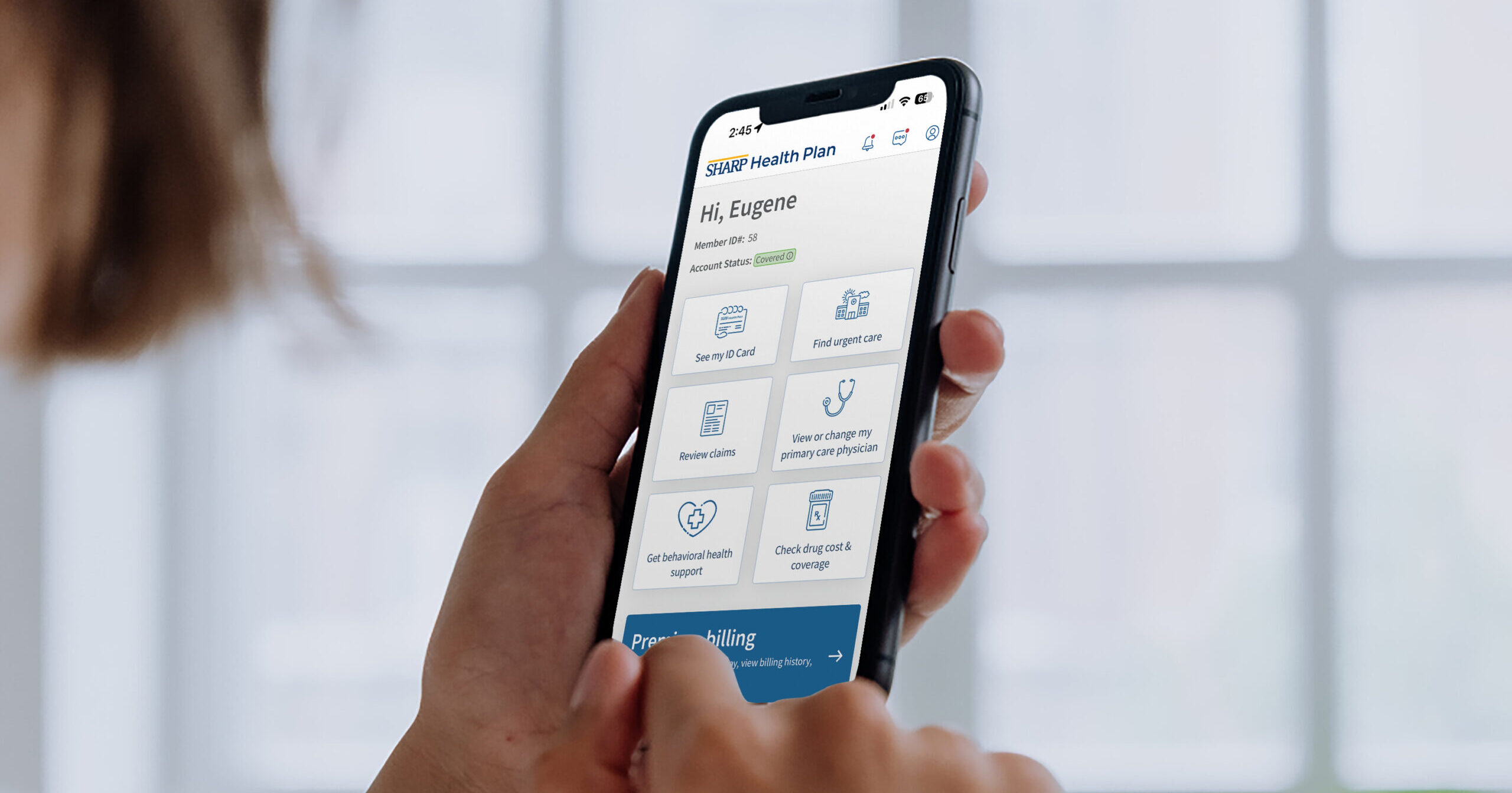 person looking at her mobile phone and accessing her health app