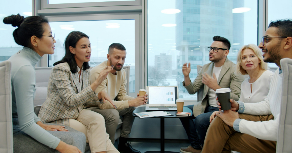 Healthcare leaders discussing digital budget priorities in a team meeting.